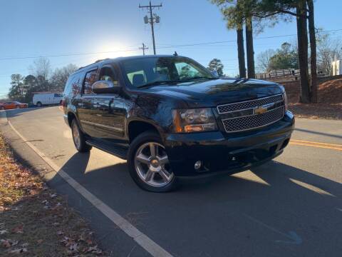 2013 Chevrolet Suburban for sale at THE AUTO FINDERS in Durham NC