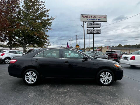 2009 Toyota Camry for sale at FAMILY AUTO CENTER in Greenville NC