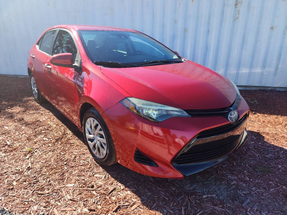 2018 Toyota Corolla for sale at Trek Auto in Orlando, FL