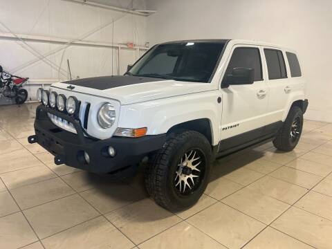 2012 Jeep Patriot for sale at ROADSTERS AUTO in Houston TX