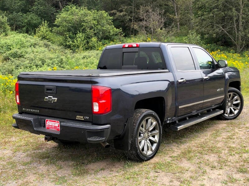 Used 2018 Chevrolet Silverado 1500 LTZ Z71 with VIN 3GCUKSEC0JG280574 for sale in Iron River, MI