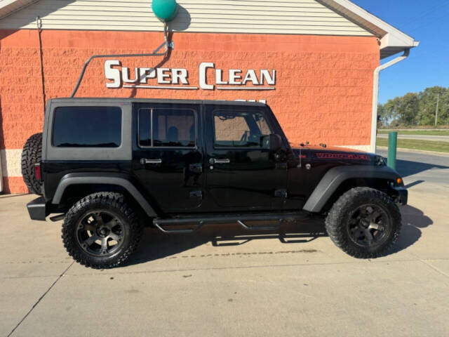 2014 Jeep Wrangler Unlimited for sale at Illinois Auto Wholesalers in Tolono, IL