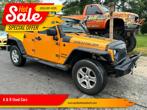 2012 Jeep Wrangler Unlimited for sale at A & R Used Cars in Clayton NJ