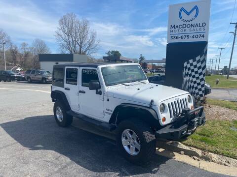 2013 Jeep Wrangler Unlimited for sale at MacDonald Motor Sales in High Point NC
