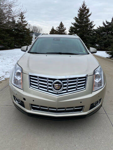 2013 Cadillac SRX for sale at Roman's Auto Sales in Warren MI