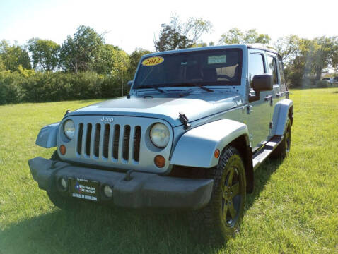 2012 Jeep Wrangler Unlimited for sale at LA PULGA DE AUTOS in Dallas TX