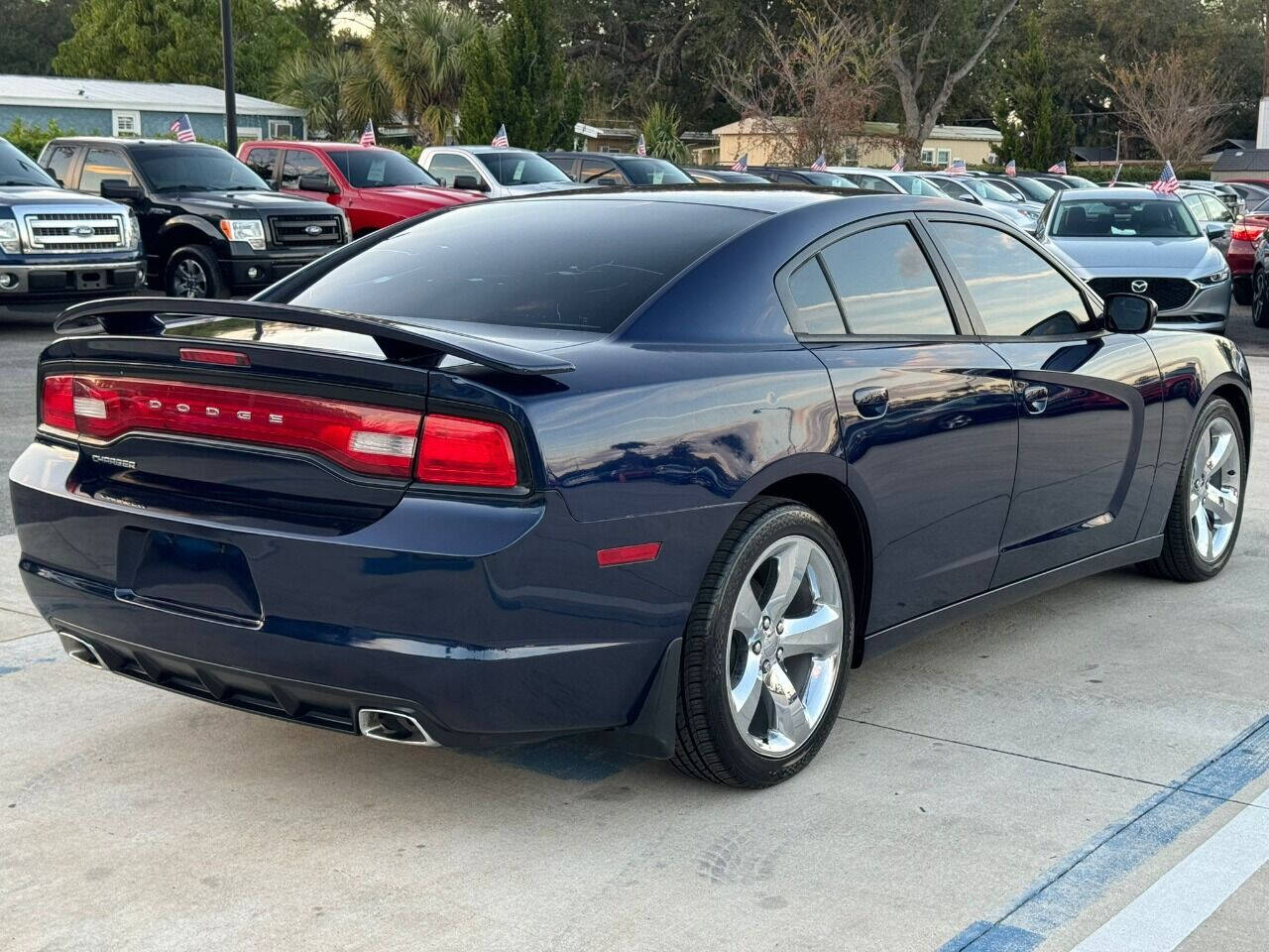 2014 Dodge Charger for sale at DJA Autos Center in Orlando, FL