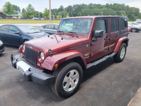 2009 Jeep Wrangler Unlimited for sale at Auto World of Atlanta Inc in Buford GA