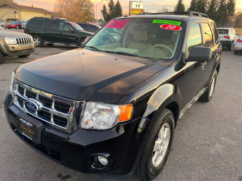 2010 Ford Escape for sale at BELOW BOOK AUTO SALES in Idaho Falls ID