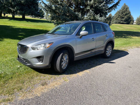 2015 Mazda CX-5 for sale at BELOW BOOK AUTO SALES in Idaho Falls ID