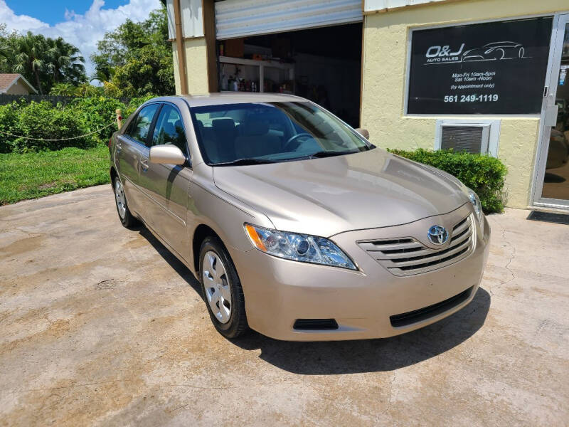 2009 Toyota Camry for sale at O & J Auto Sales in Royal Palm Beach FL