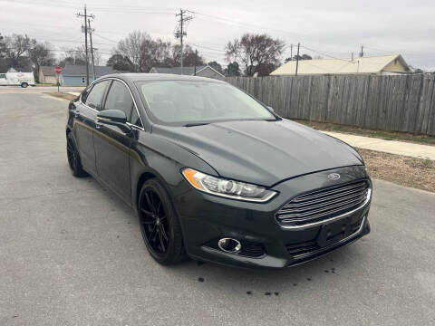 2015 Ford Fusion for sale at Ideal Auto Sales in Dunn NC