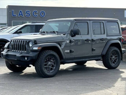 2021 Jeep Wrangler Unlimited for sale at LASCO FORD in Fenton MI