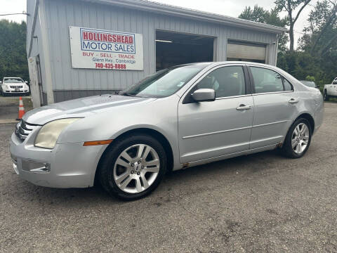 2006 Ford Fusion for sale at HOLLINGSHEAD MOTOR SALES in Cambridge OH
