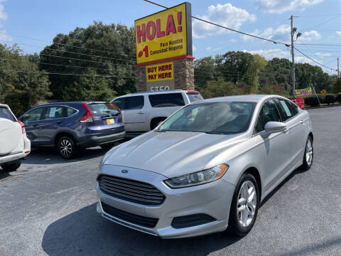2013 Ford Fusion for sale at NO FULL COVERAGE AUTO SALES LLC in Austell GA