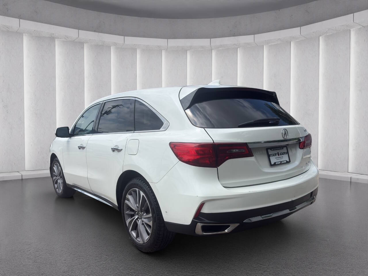 View vehicle photo 3