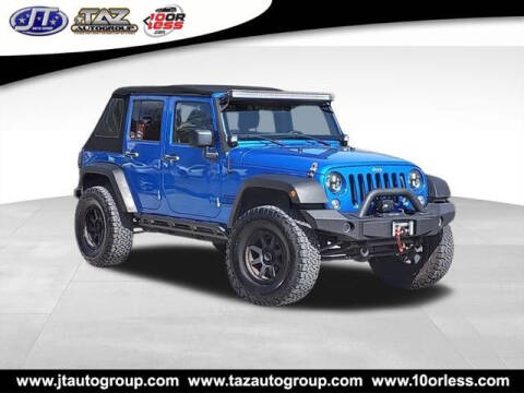 2016 Jeep Wrangler Unlimited for sale at J T Auto Group in Sanford NC