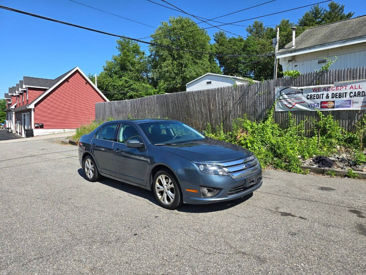 2012 Ford Fusion for sale at PAKLAND AUTO SALES in Auburn, MA