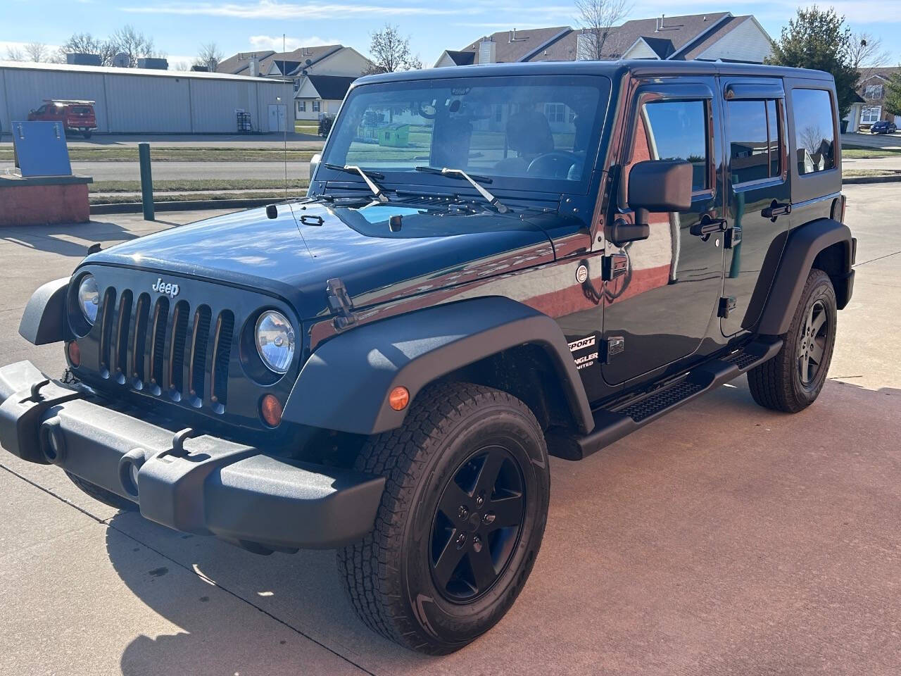 2014 Jeep Wrangler Unlimited for sale at Illinois Auto Wholesalers in Tolono, IL