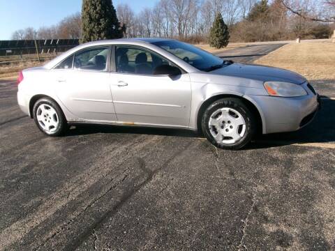 2007 Pontiac G6 for sale at Crossroads Used Cars Inc. in Tremont IL