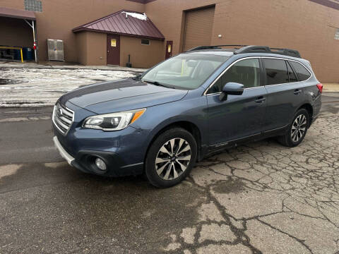 2015 Subaru Outback for sale at Decisive Auto Sales in Shelby Township MI