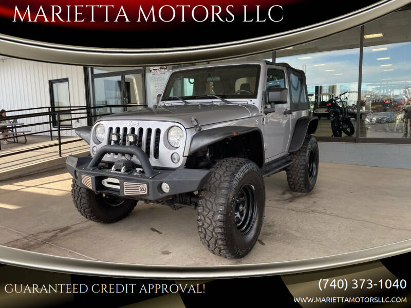 2015 Jeep Wrangler for sale at MARIETTA MOTORS LLC in Marietta OH