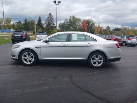 2015 Ford Taurus for sale at Hilltop Auto in Clare MI