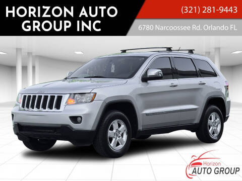 2011 Jeep Grand Cherokee for sale at HORIZON AUTO GROUP INC in Orlando FL