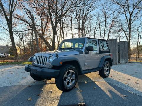 2014 Jeep Wrangler for sale at Family Certified Motors in Manchester NH