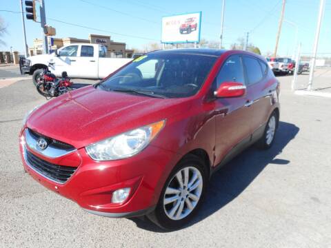 2013 Hyundai Tucson for sale at AUGE'S SALES AND SERVICE in Belen NM