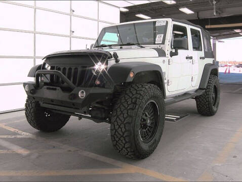 2014 Jeep Wrangler Unlimited for sale at Watson Auto Group in Fort Worth TX