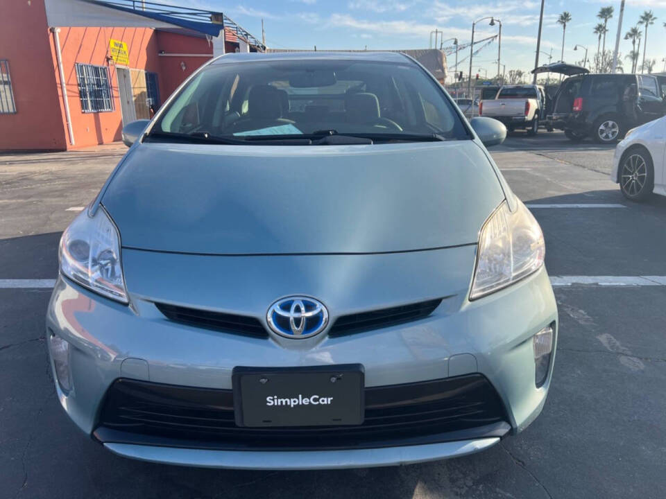 2012 Toyota Prius for sale at Unique Auto Sales, Inc. in Bell, CA