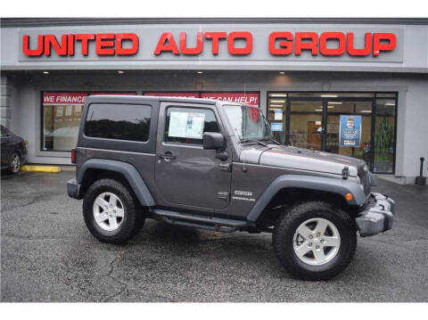 2016 Jeep Wrangler for sale at United Auto Group in Putnam CT