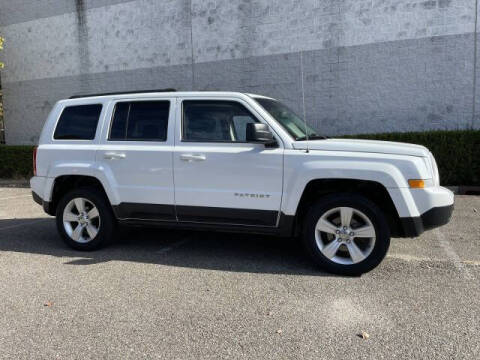 2014 Jeep Patriot for sale at Select Auto in Smithtown NY