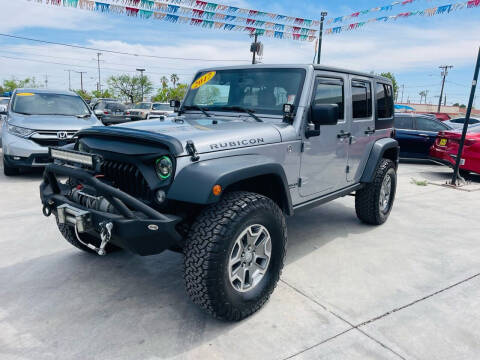 2017 Jeep Wrangler Unlimited for sale at A AND A AUTO SALES in Gadsden AZ