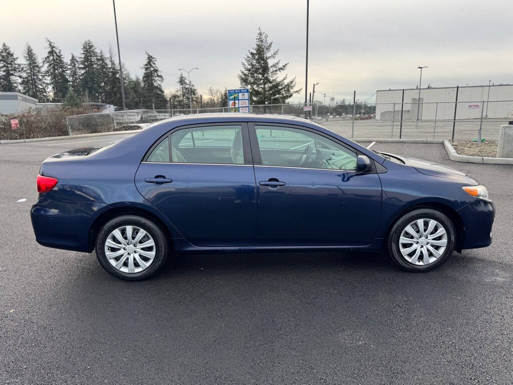 2013 Toyota Corolla for sale at The Price King Auto in LAKEWOOD, WA