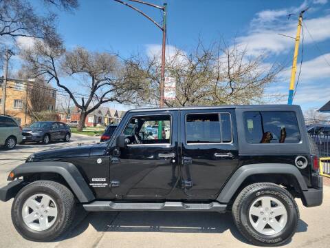 2013 Jeep Wrangler Unlimited for sale at ROCKET AUTO SALES in Chicago IL