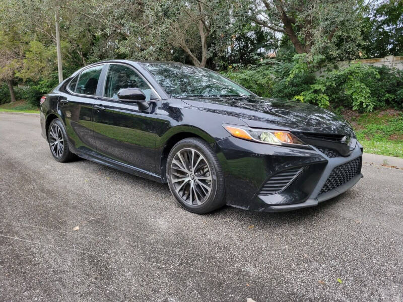 2019 Toyota Camry for sale at DELRAY AUTO MALL in Delray Beach FL