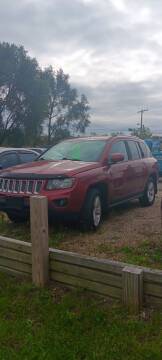 2011 Jeep Grand Cherokee for sale at CHUCKS AUTO SERVICE LLC in Sturgis MI