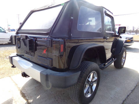 2012 Jeep Wrangler for sale at English Autos in Grove City PA