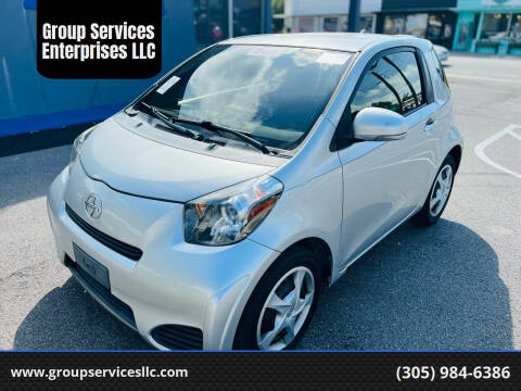 https://cdn05.carsforsale.com/3b6f1b9210b3d8790aa5c3f3ea7672f8/480x360/2014-scion-iq-base-2dr-hatchback.jpg