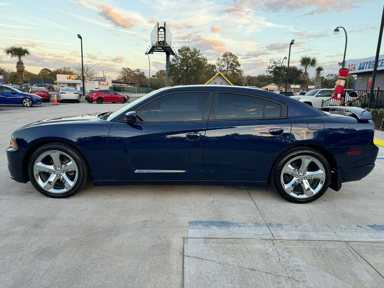 2014 Dodge Charger for sale at DJA Autos Center in Orlando, FL