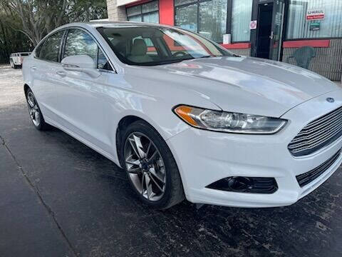 2016 Ford Fusion for sale at Sunset Point Auto Sales & Car Rentals in Clearwater FL