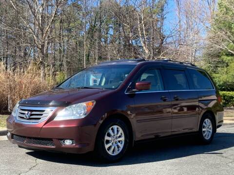 2010 Honda Odyssey for sale at Triangle Motors Inc in Raleigh NC