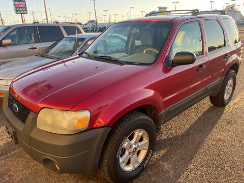 2005 Ford Escape for sale at BELOW BOOK AUTO SALES in Idaho Falls ID