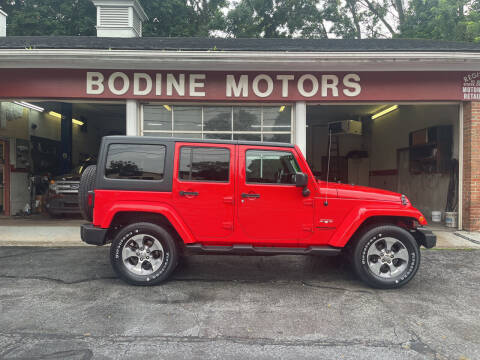 2016 Jeep Wrangler Unlimited for sale at BODINE MOTORS in Waverly NY