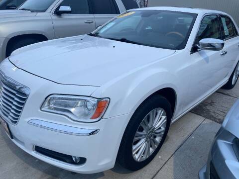 2012 Chrysler 300 for sale at Azteca Auto Sales LLC in Des Moines IA