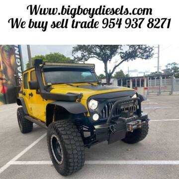 2009 Jeep Wrangler Unlimited for sale at BIG BOY DIESELS in Fort Lauderdale FL