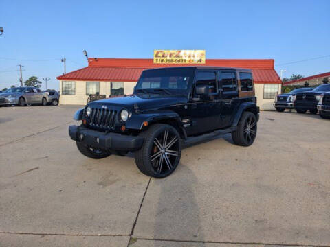 2013 Jeep Wrangler Unlimited for sale at CarZoneUSA in West Monroe LA