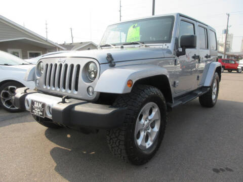 2014 Jeep Wrangler Unlimited for sale at Dam Auto Sales in Sioux City IA